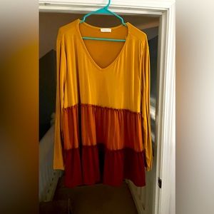 Beautiful yellow, orange, and red blouse